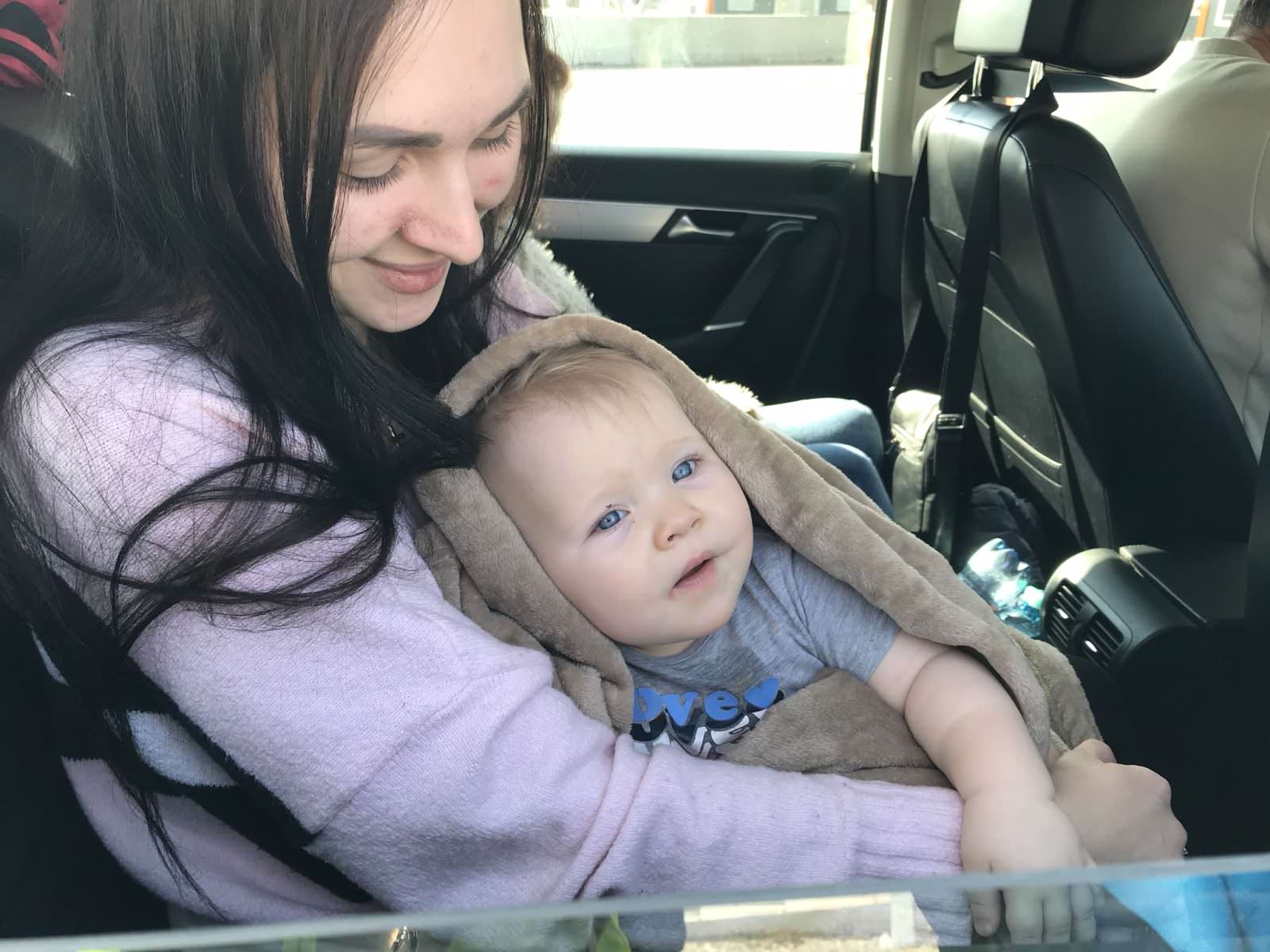Eleven-month-old Kamina, her mother and grandparents fleeing the conflict in Ukraine cross into Austria from Hungary at the Nickelsdorf crossing point. The family are heading for Belgium where they have relatives. ; Many refugees say they are on their way to join family or friends in other European Union countries while others are planning to stay in Austria. Support has been mobilized throughout Austria.